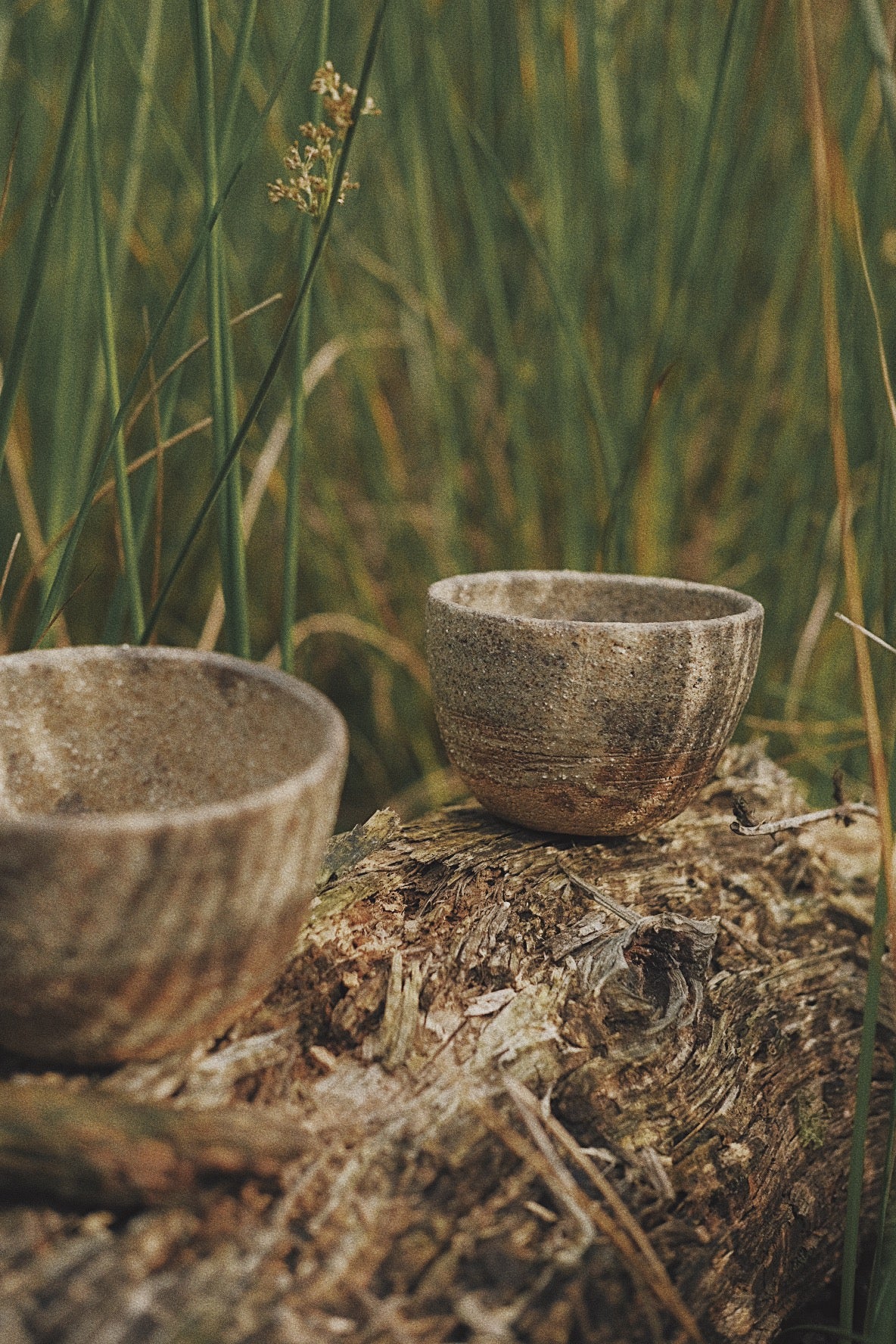 Tea bowl ash glaze golden light